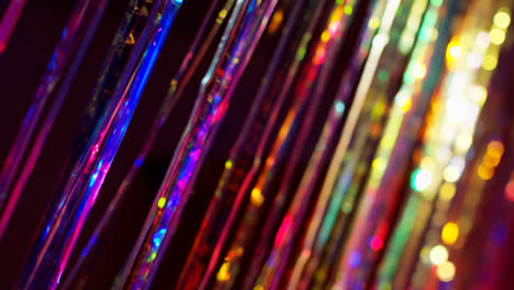 Shot-Of-Defocused-Tinsel-Curtain-In-Night-Club-Or-Disco-With-Reflected-Sparkling-Lights-1
